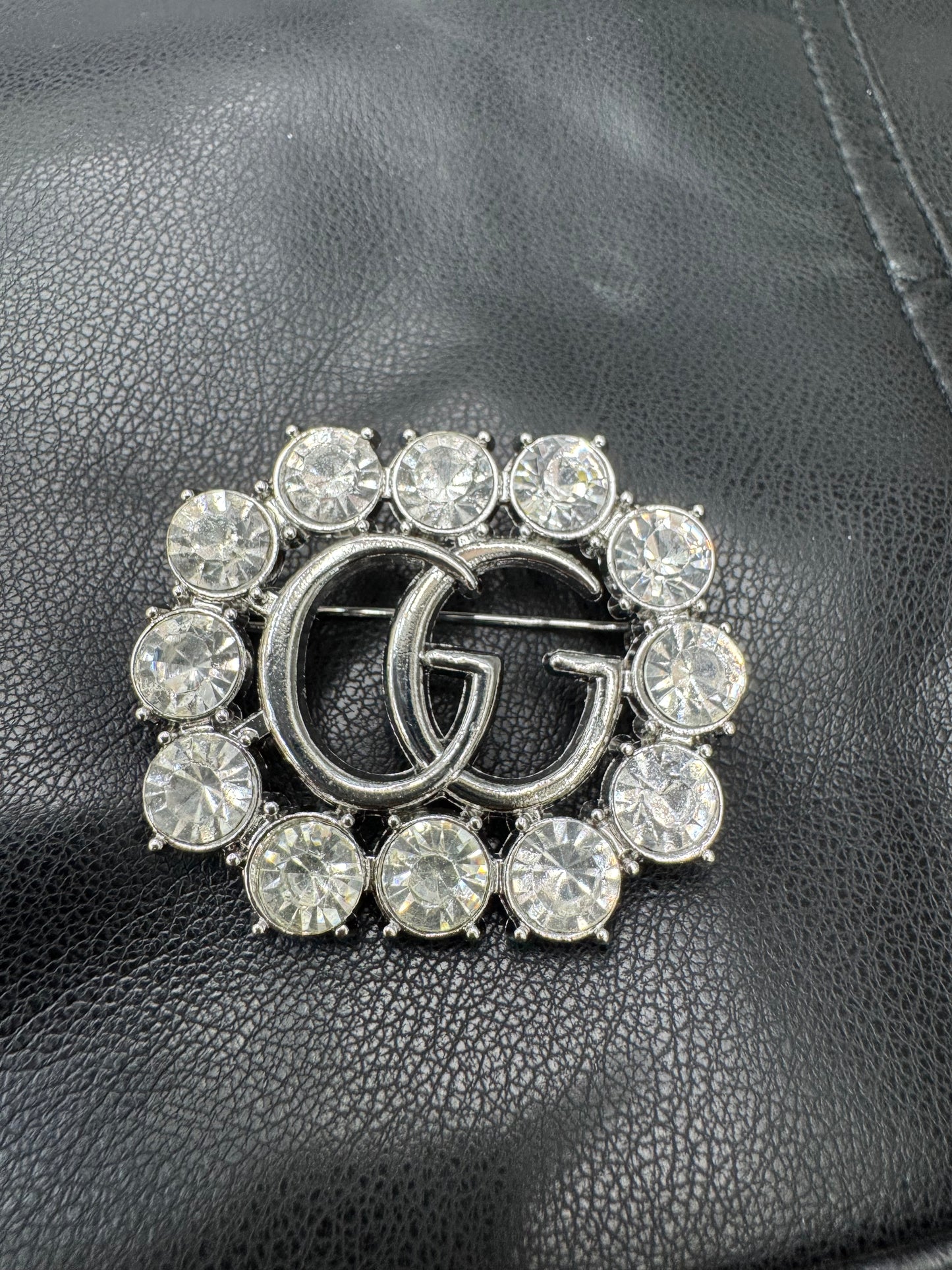 GG brooch