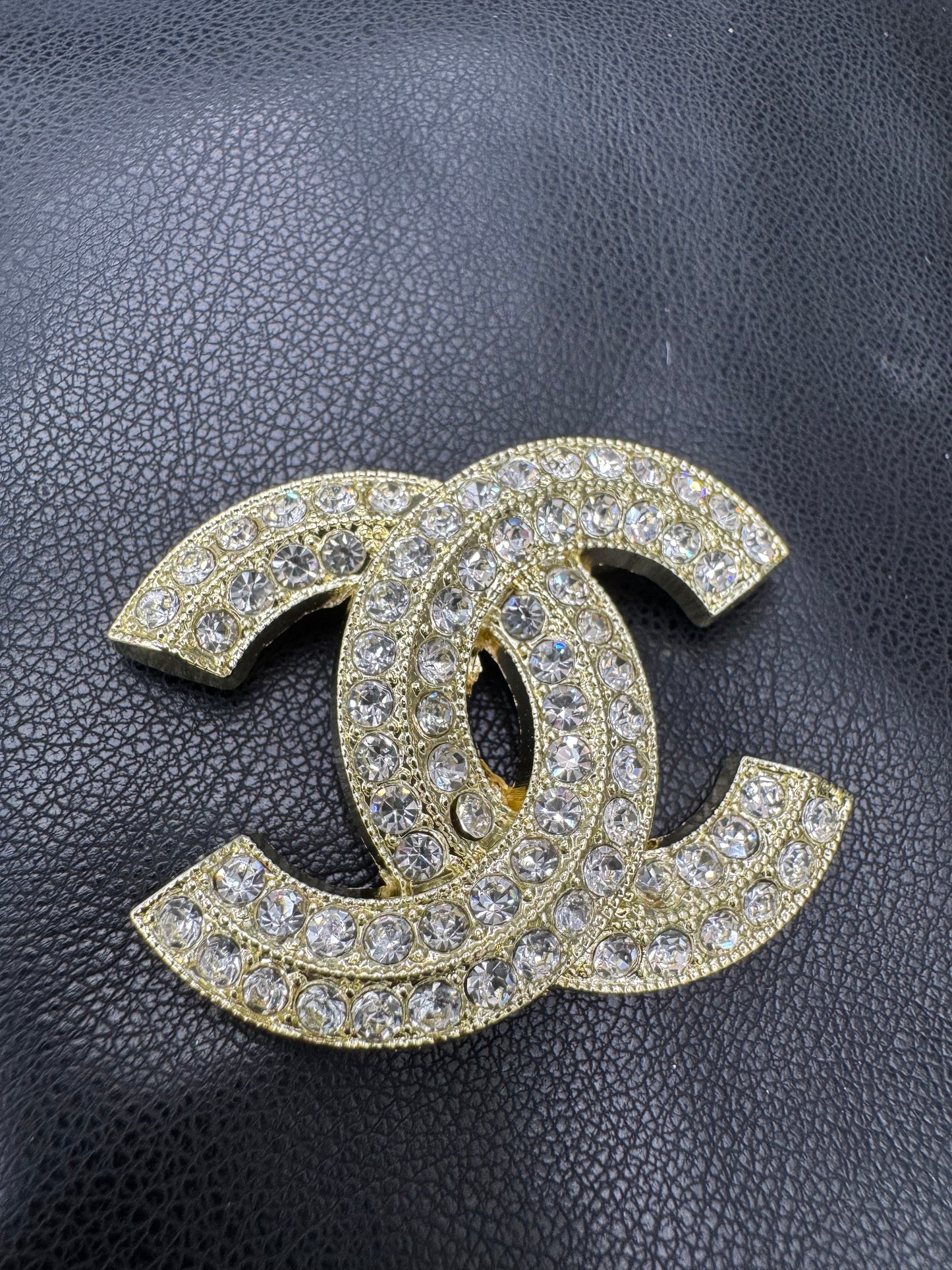 CC brooch