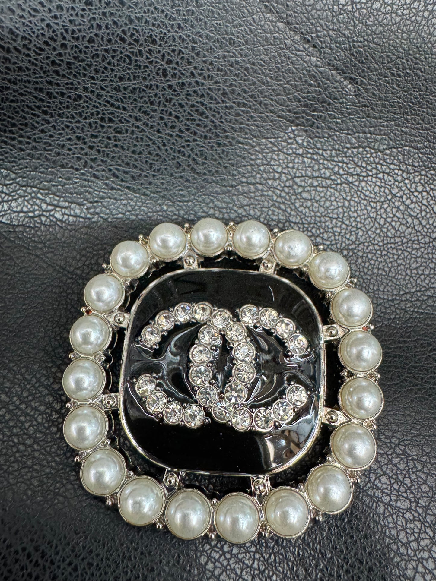CC brooch
