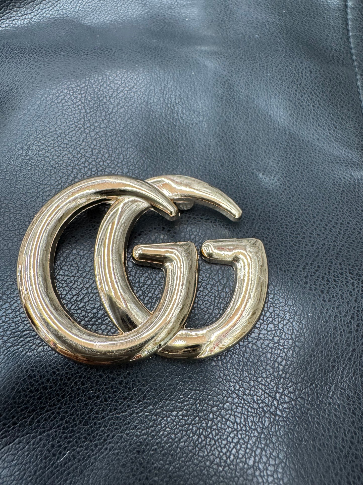GG brooch