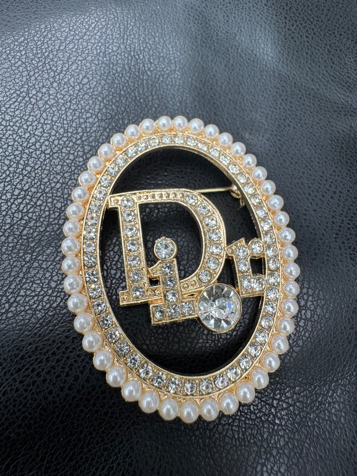 Dior brooch