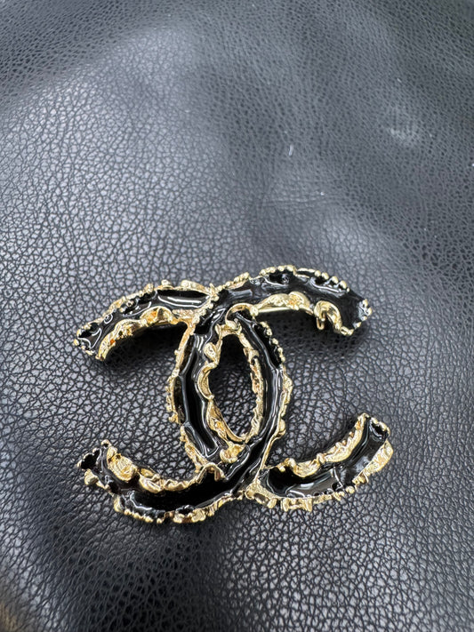 CC brooch
