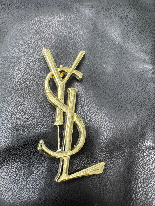 YSL brooch