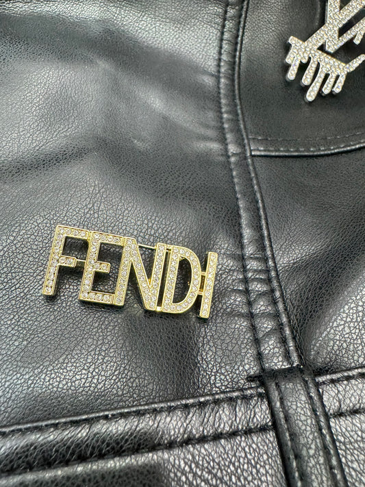 FF brooch