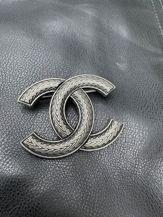 CC brooch