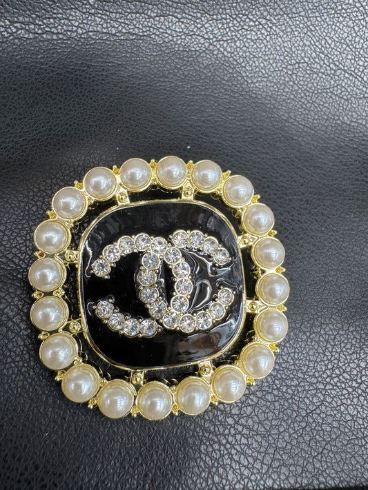 CC brooch