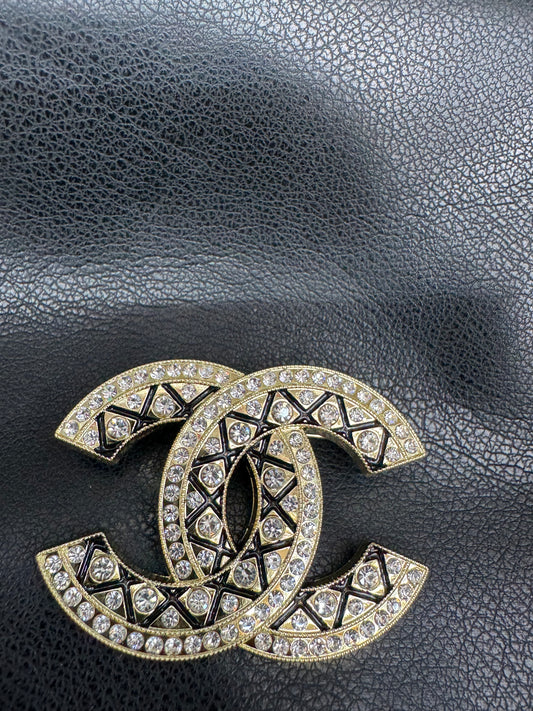 CC brooch