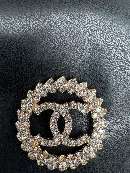 CC brooch