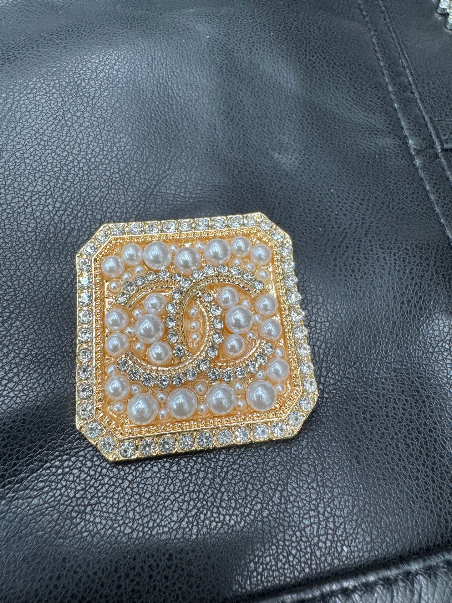 CC brooch