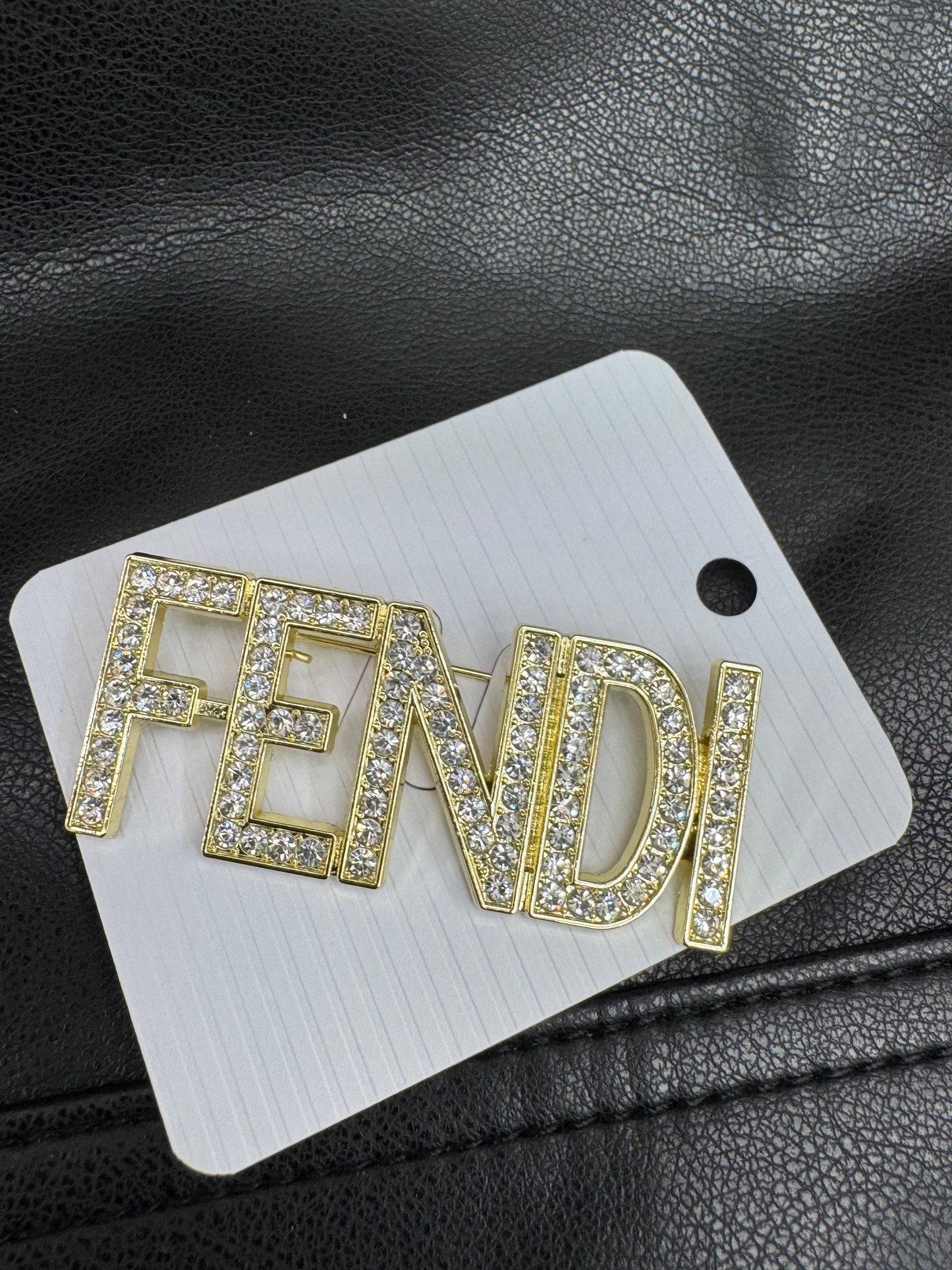 FF brooch