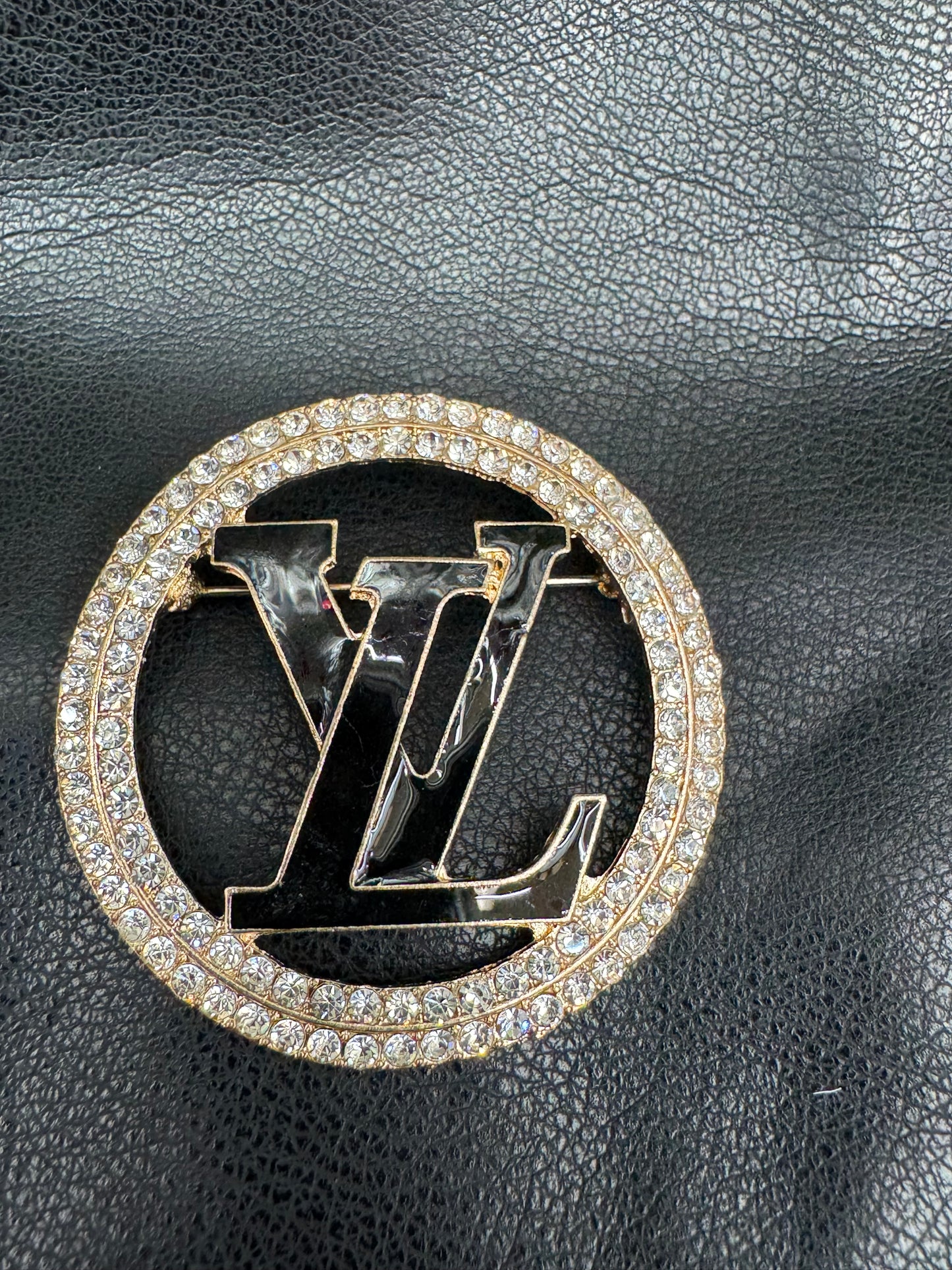 LV brooch