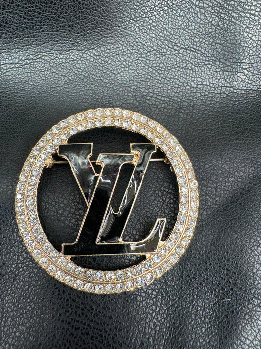 LV brooch