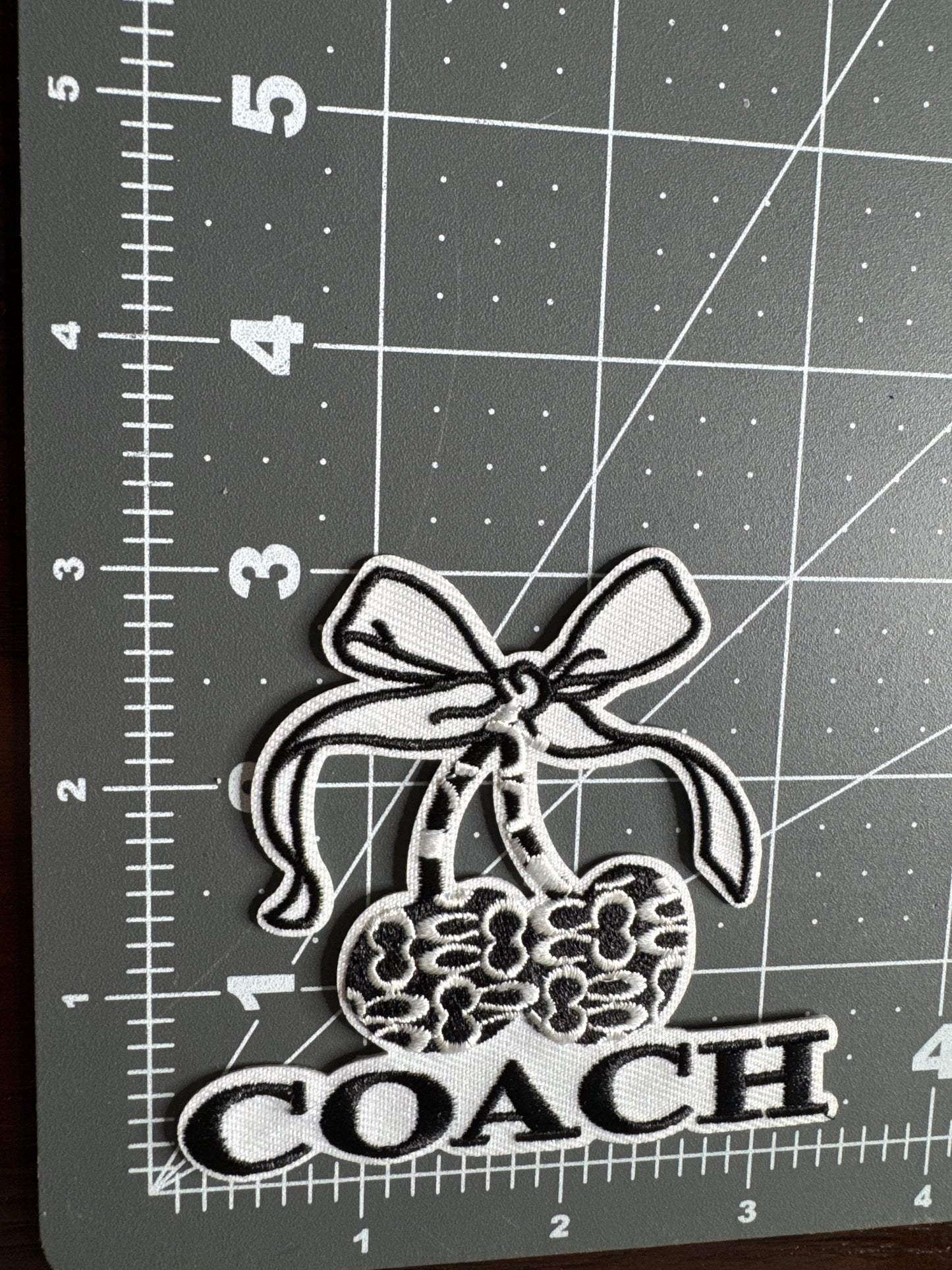 Coach cherry