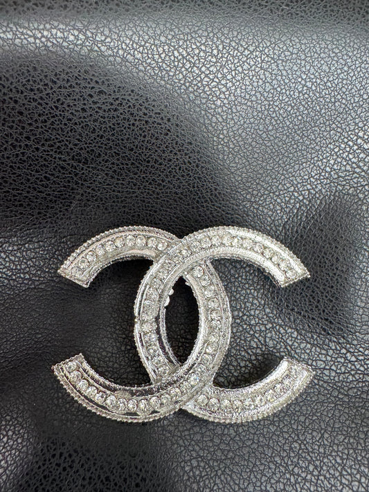 CC brooch
