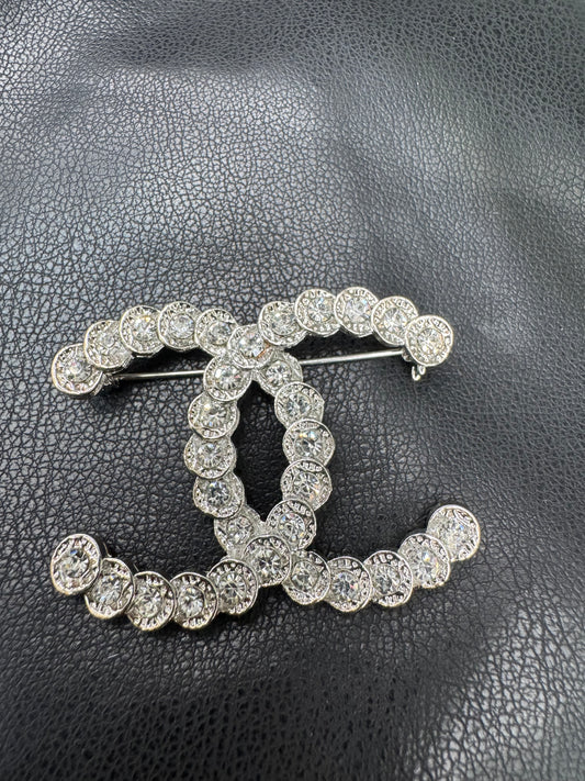 CC brooch