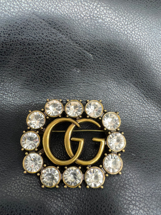 GG brooch