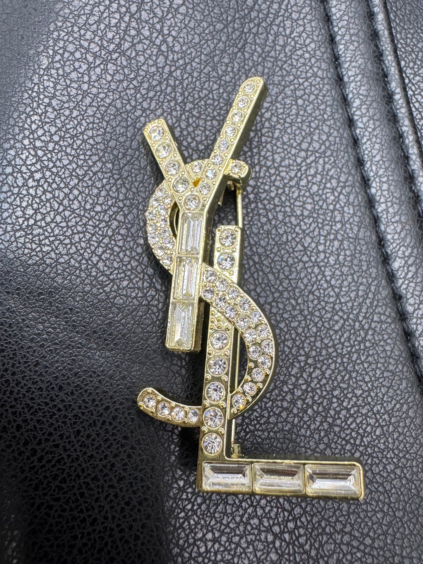 YSL brooch? ￼