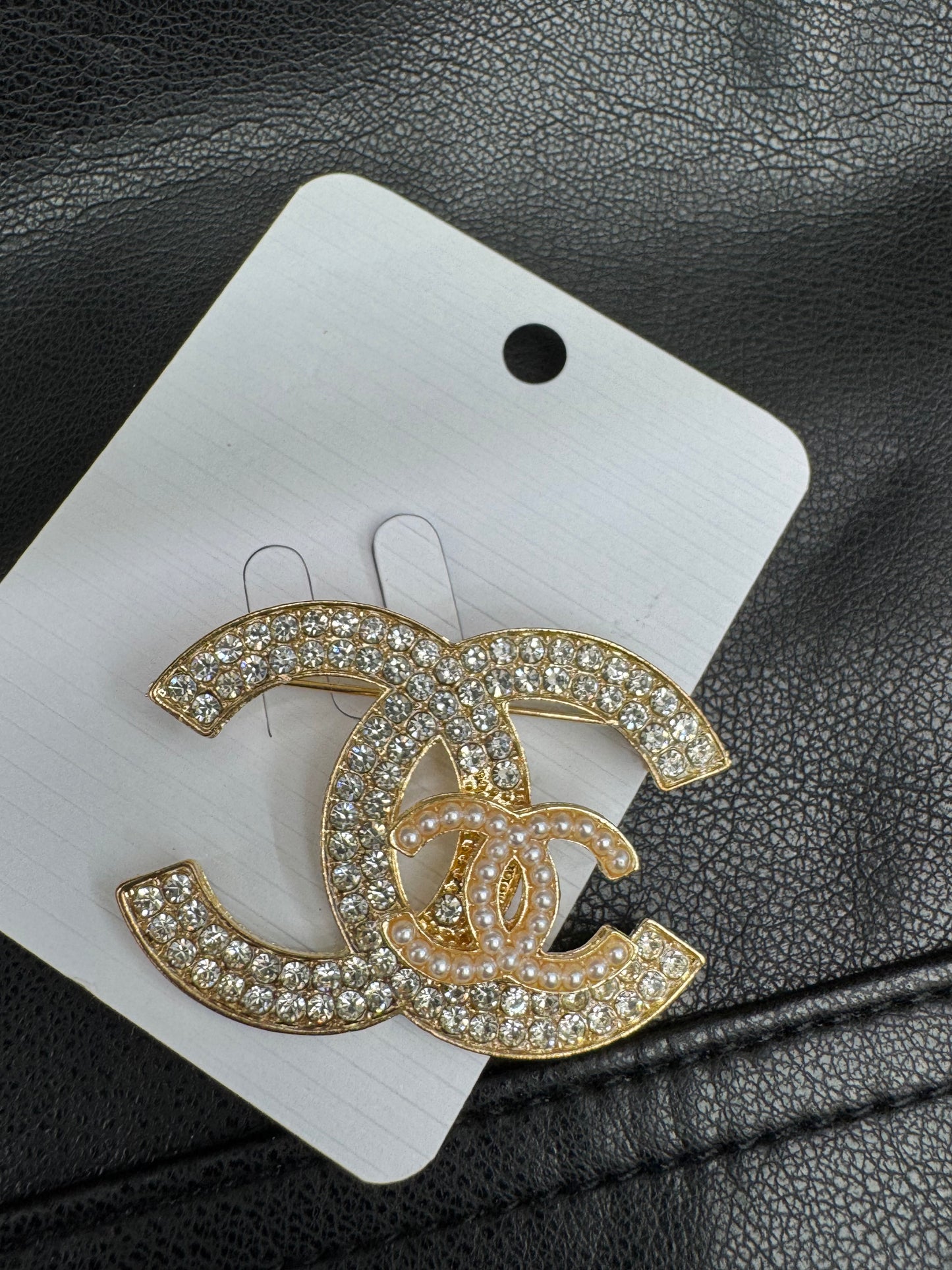 CC brooch