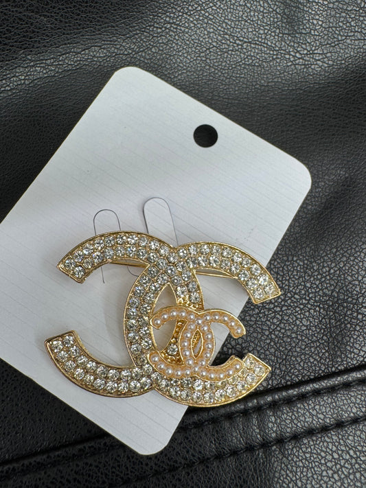 CC brooch