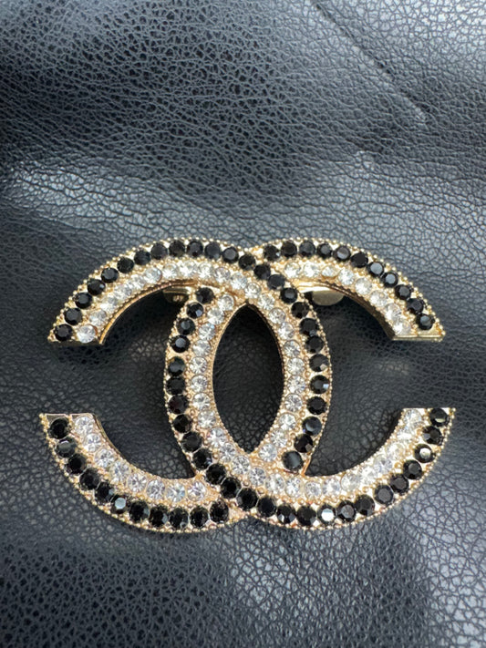 CC brooch