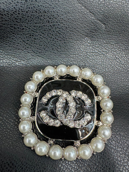 CC brooch