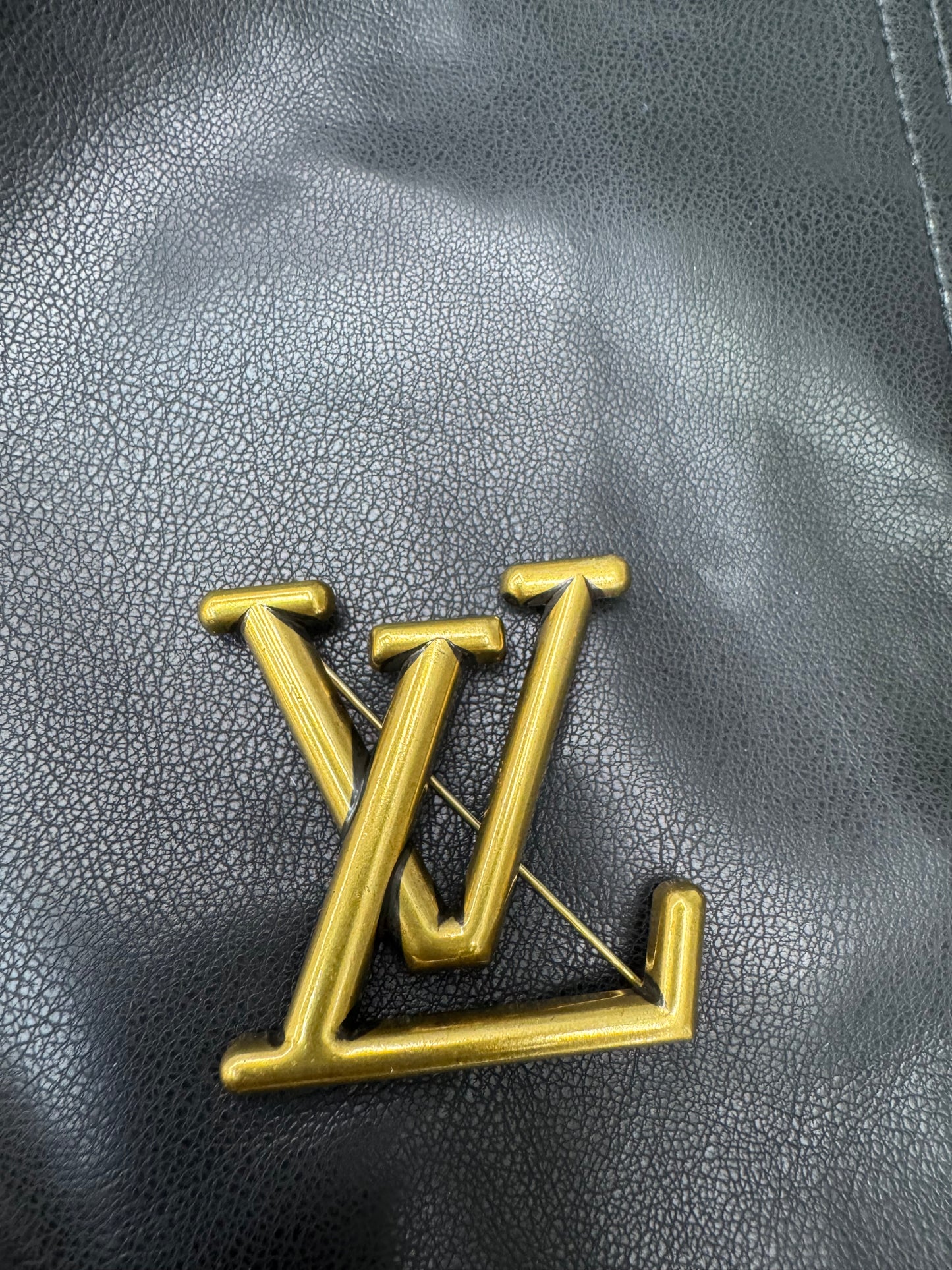 LV brooch
