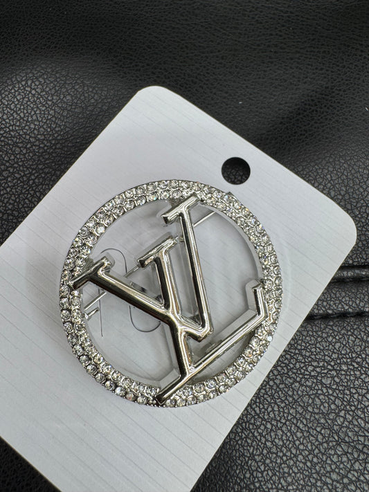 LV brooch