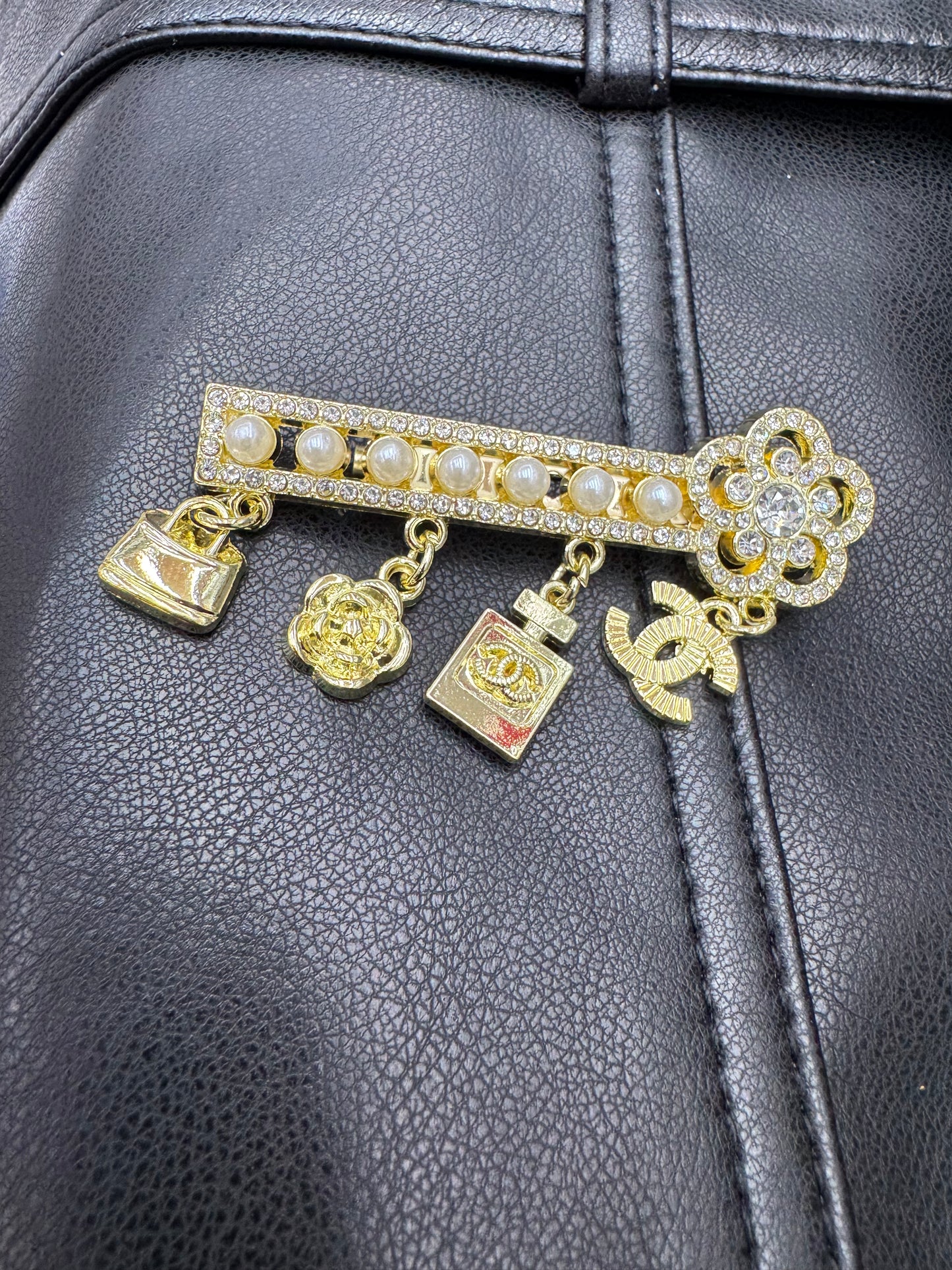 CC brooch