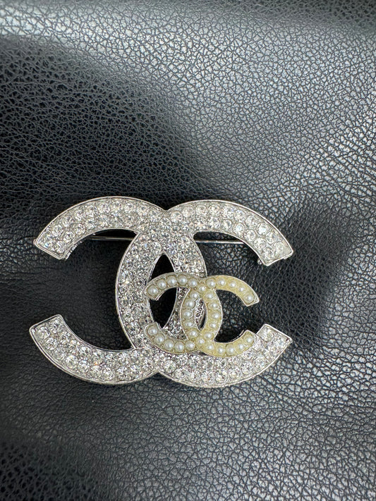 CC brooch