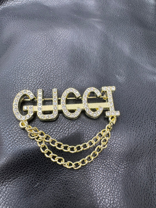 GG brooch