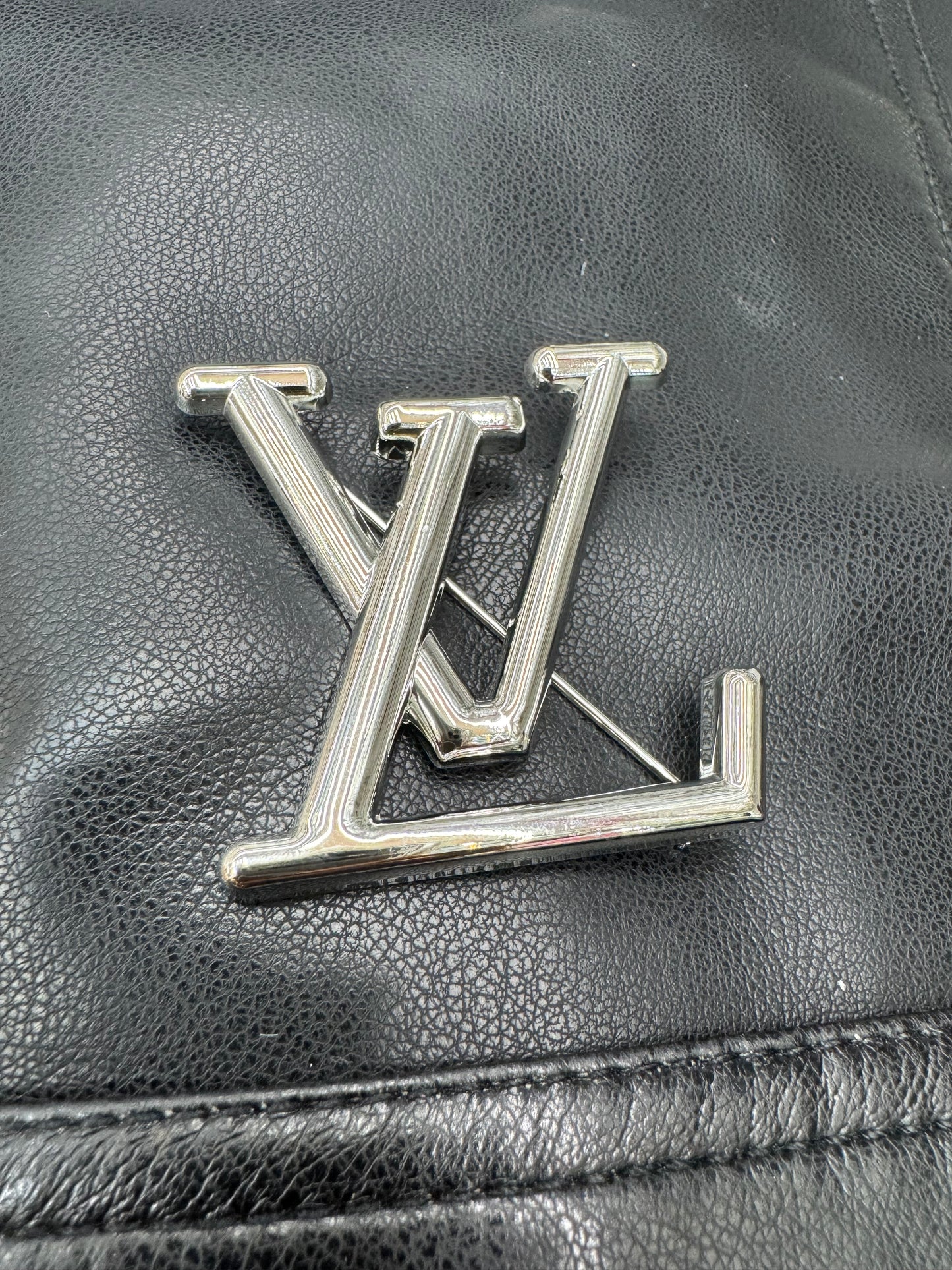 LV brooch