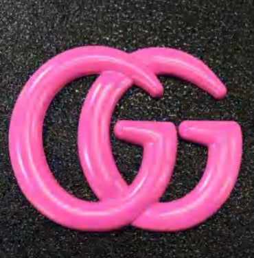 GG emblem catalog in gold and black